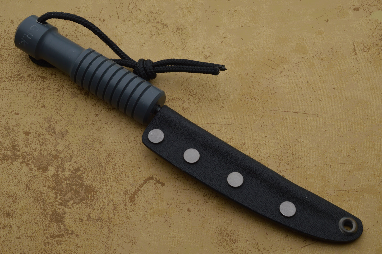 G.H.K. "Compact Spike", Triangular Ground Tip, Acetal Handle, Kydex Sheath
