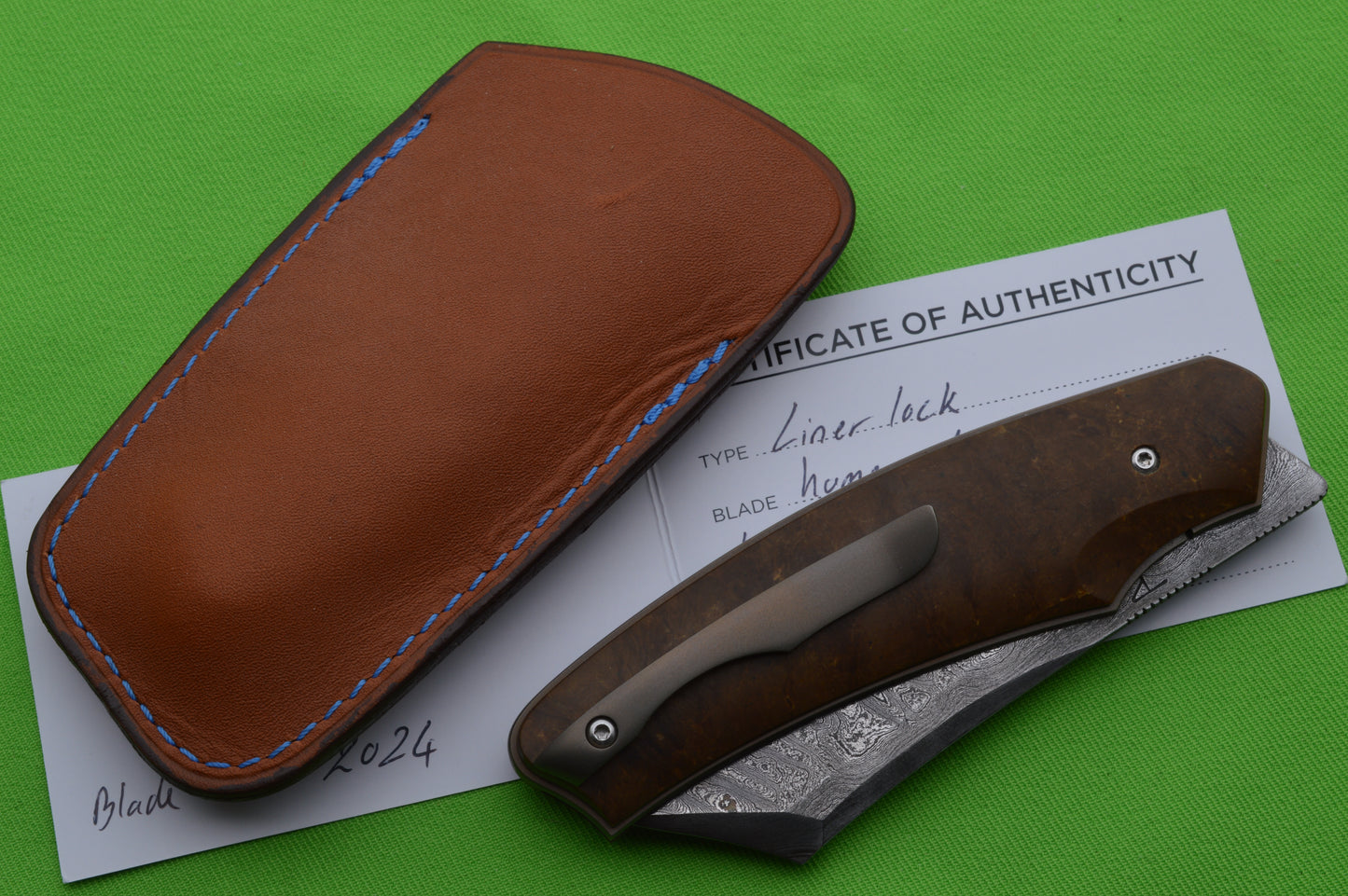 David Lespect Damascus Liner-Lock Front Flipper, Leather Slip (SOLD)