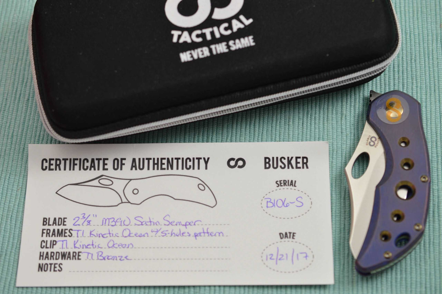 Olamic Cutlery BUSKER, Semper M390 Blade, Titanium Kinetic Ocean Frame (SOLD)