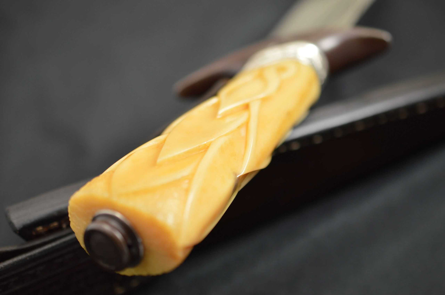 Larry Fuegen, M.S. Fighter, Carved Fossilized Material Handle, Sterling Silver Collar (SOLD)