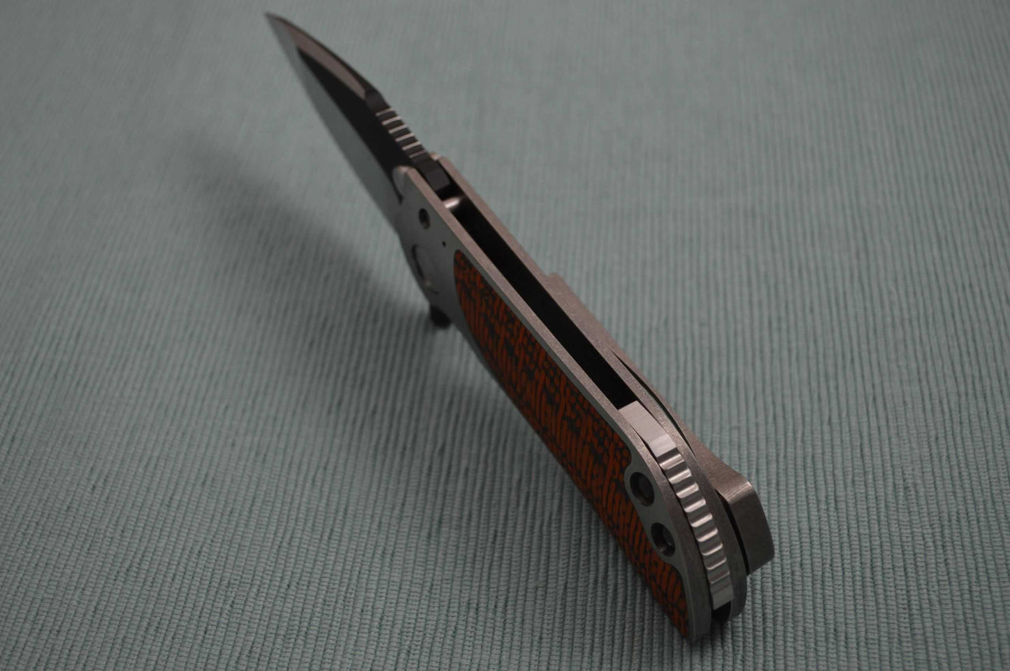Direware M8 Flipper, Ti Frame, Double Sided Orange / Black Carbon Fiber Inlays, Satin Blade Black Ceramic Flats (SOLD)