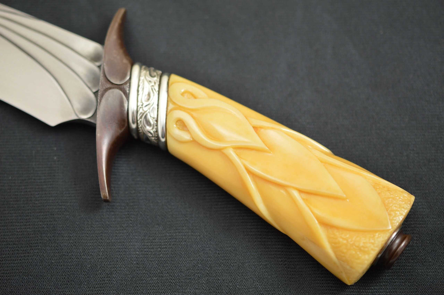 Larry Fuegen, M.S. Fighter, Carved Fossilized Material Handle, Sterling Silver Collar (SOLD)