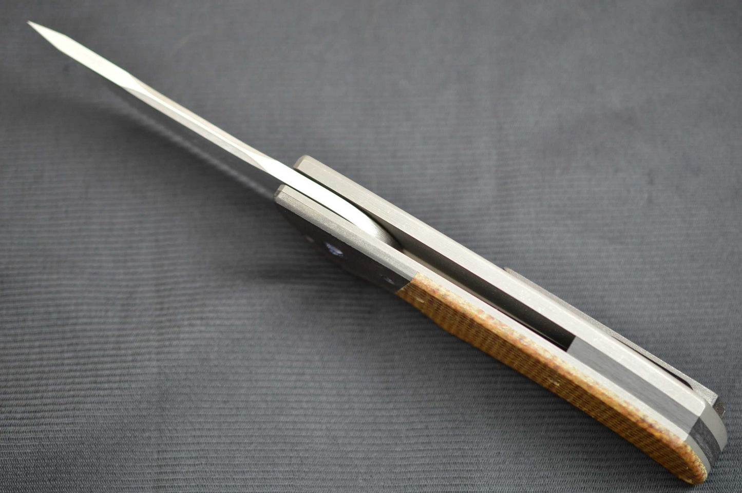 Pohan Leu "Negligence" Frame-Lock Flipper, Thunderstorm Kevlar, Zirconium Bolster & Clip (SOLD)