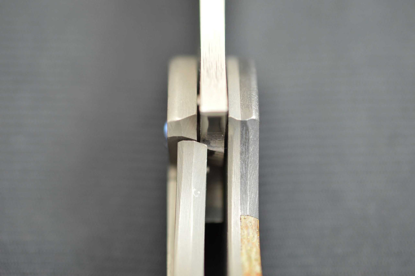 Pohan Leu "Negligence" Frame-Lock Flipper, Thunderstorm Kevlar, Zirconium Bolster & Clip (SOLD)