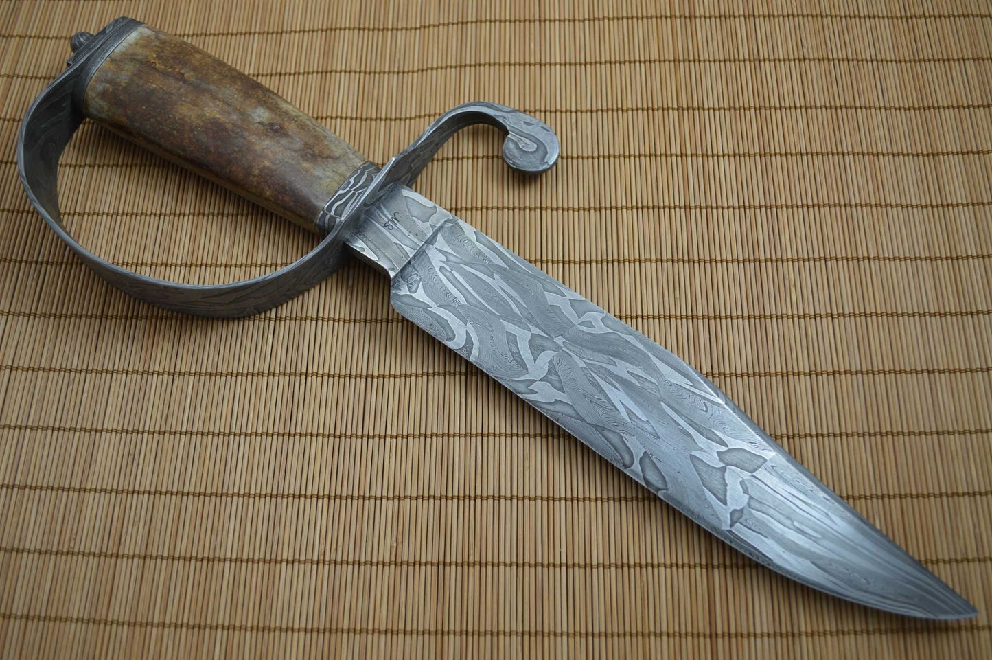David Anders M.S. D-Guard Damascus Bowie, Fossilized Handle, Rowe Leather Sheath (SOLD)