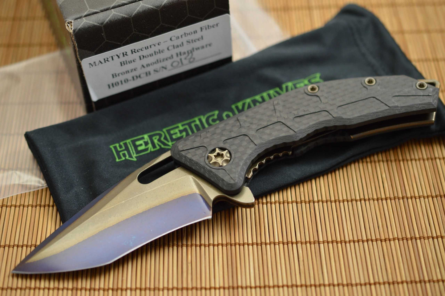 Heretic Knives, Marfione MARTYR Recurve, Carbon Fiber, Blue Double Clad Steel, Bronze Hardware (SOLD)