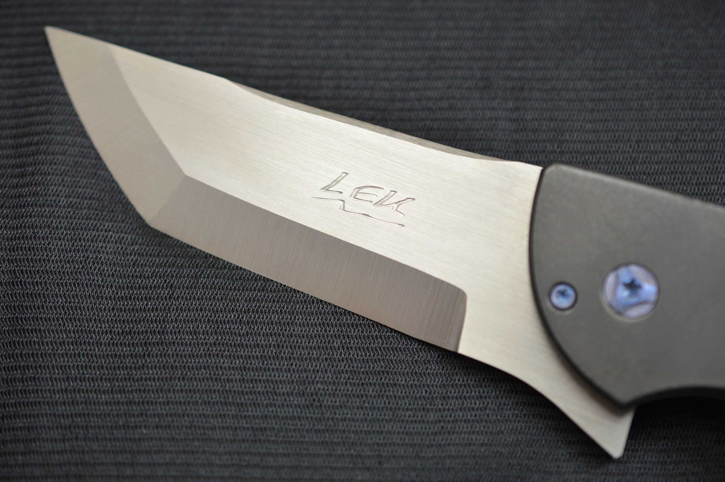 Pohan Leu "Negligence" Frame-Lock Flipper, Thunderstorm Kevlar, Zirconium Bolster & Clip (SOLD)