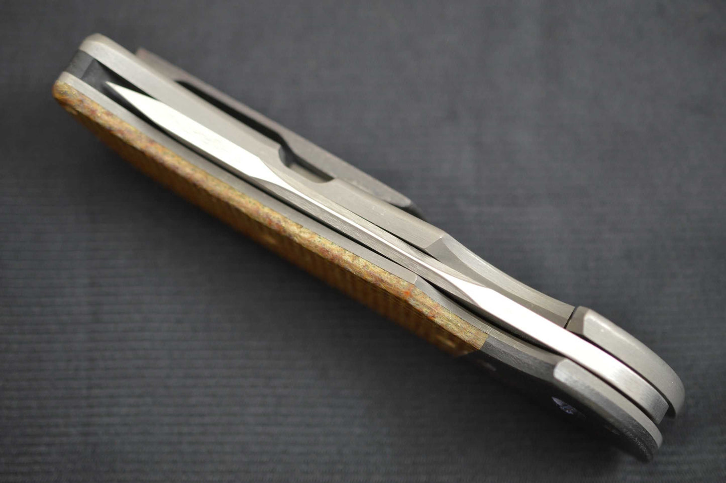 Pohan Leu "Negligence" Frame-Lock Flipper, Thunderstorm Kevlar, Zirconium Bolster & Clip (SOLD)