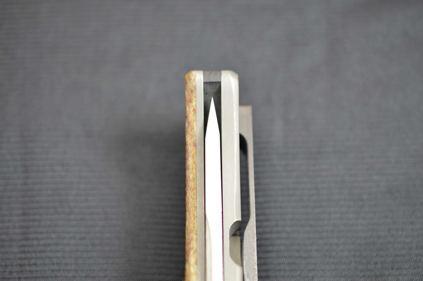 Pohan Leu "Negligence" Frame-Lock Flipper, Thunderstorm Kevlar, Zirconium Bolster & Clip (SOLD)