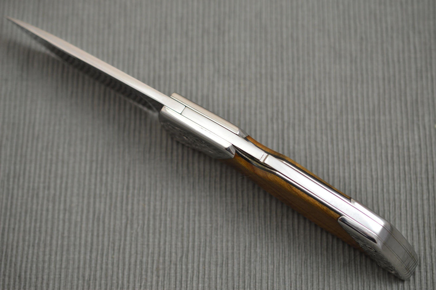 Norm Levine Engraved Lock-Back Folding Knife, Double Bolsters