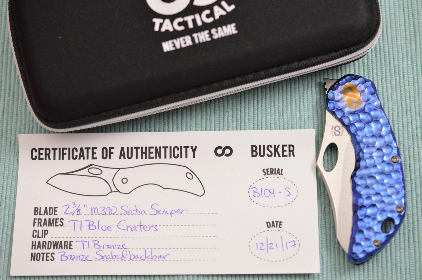 Olamic Cutlery BUSKER, Semper M390 Blade, Blue Craters Titanium Frame (SOLD)