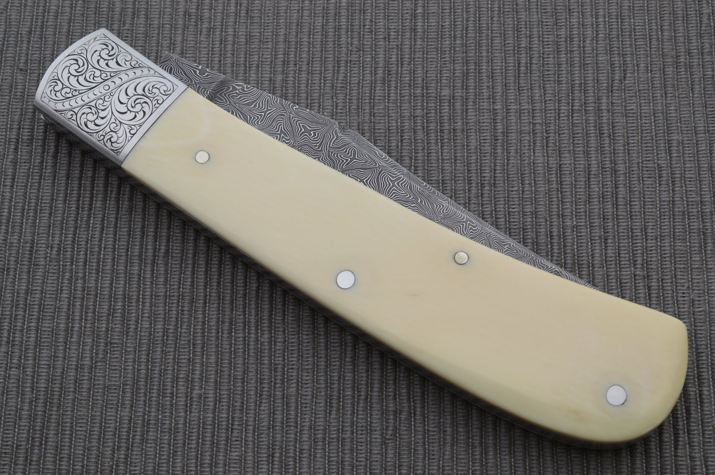 Steve Dunn M.S. Damascus Engraved Goat Horn Trapper, Slip-Joint Folding Knife