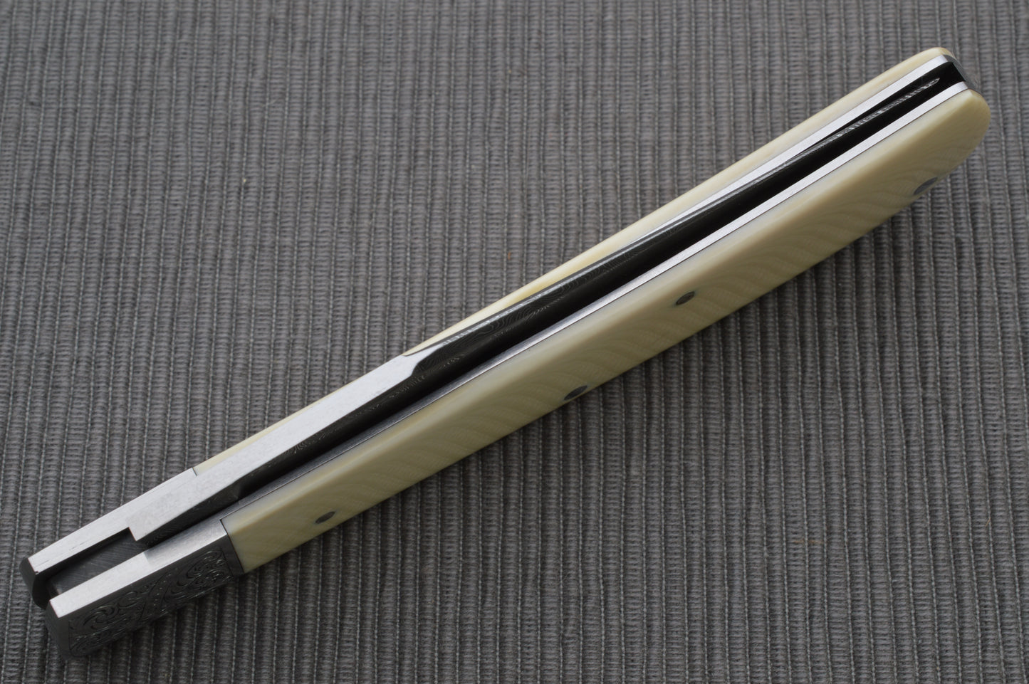 Steve Dunn M.S. Damascus Engraved Goat Horn Trapper, Slip-Joint Folding Knife