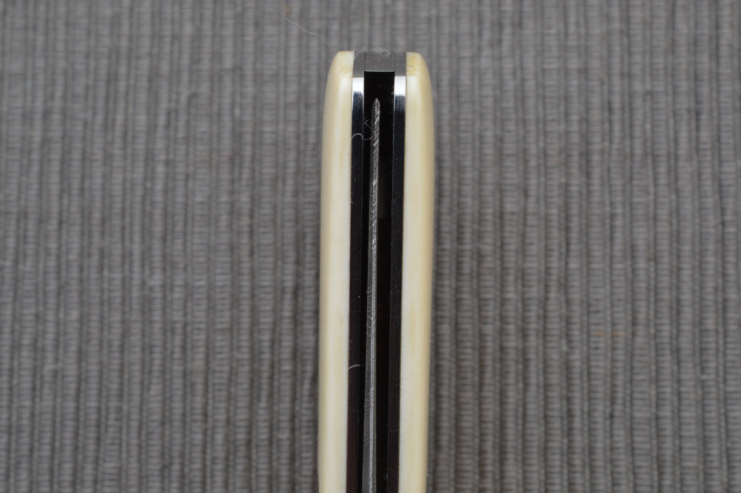 Steve Dunn M.S. Damascus Engraved Goat Horn Trapper, Slip-Joint Folding Knife