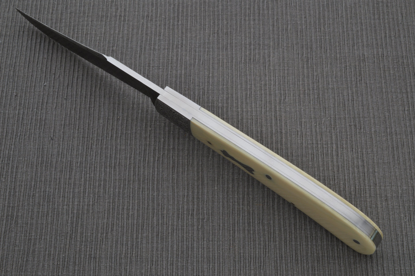 Steve Dunn M.S. Damascus Engraved Goat Horn Trapper, Slip-Joint Folding Knife