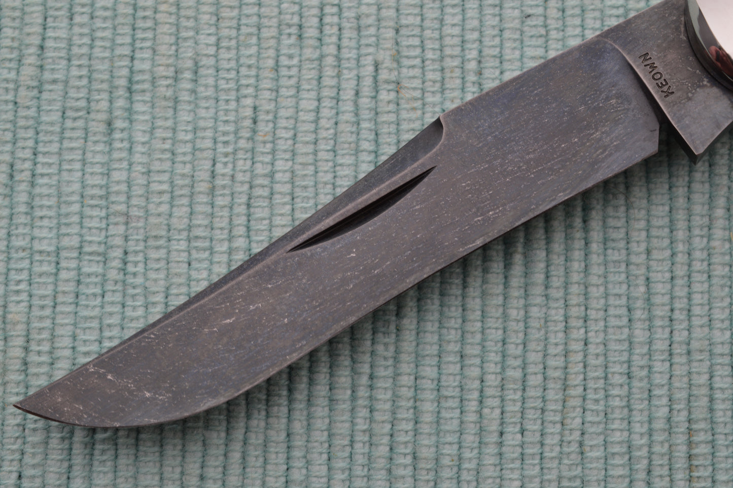 Daniel Keown Blued A2 Trapper, Ancient Fossil Material Slip-Joint Folding Knife (SOLD)
