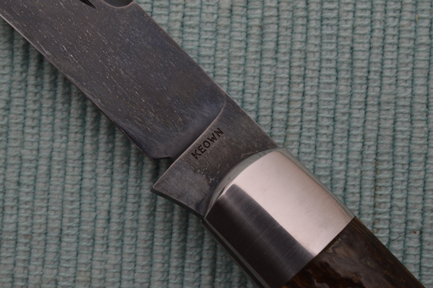 Daniel Keown Blued A2 Trapper, Ancient Fossil Material Slip-Joint Folding Knife (SOLD)