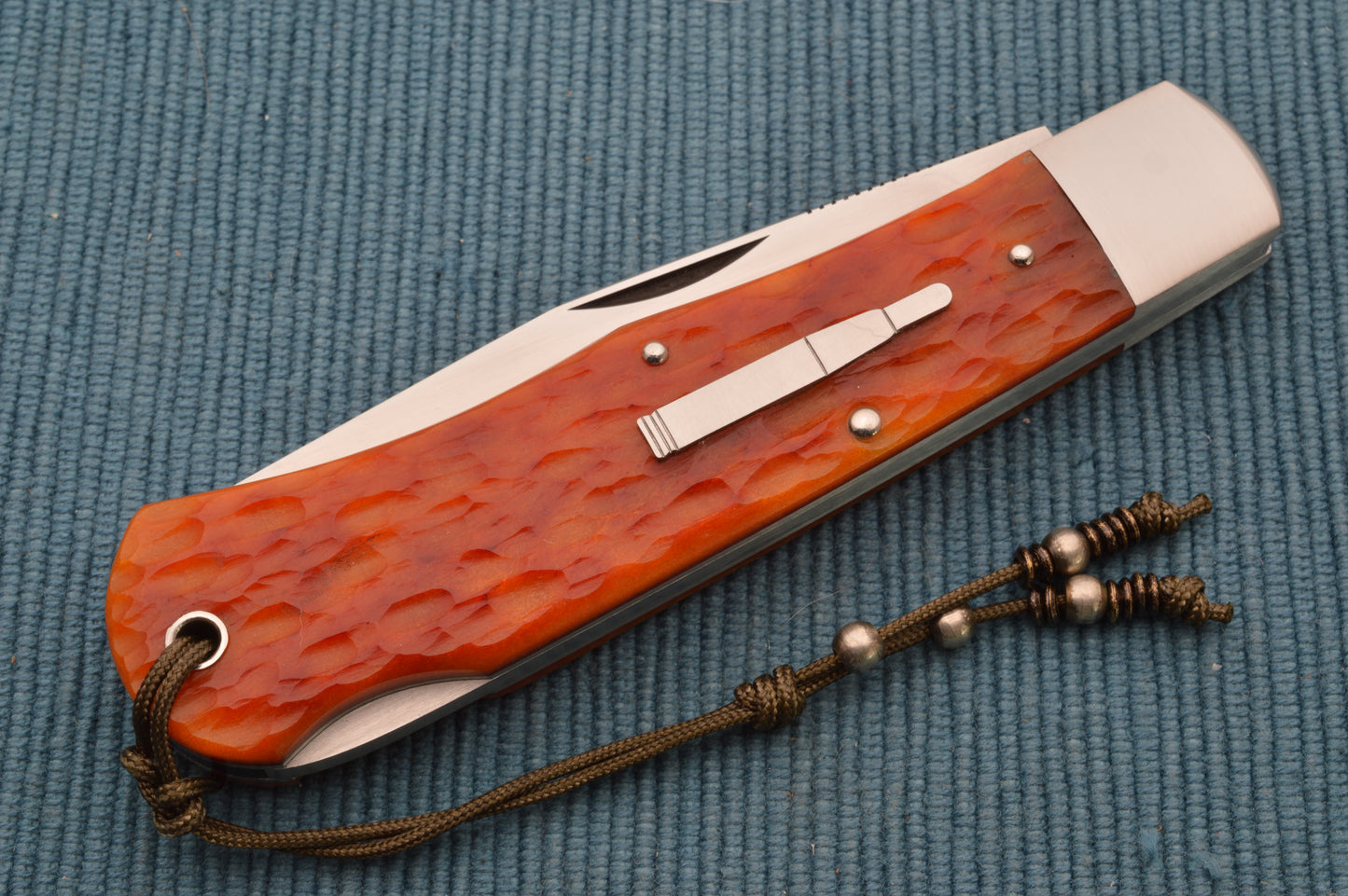 Tom Ploppert Remington 1303 Amber Jigged Bone Lock-Back Folding Knife