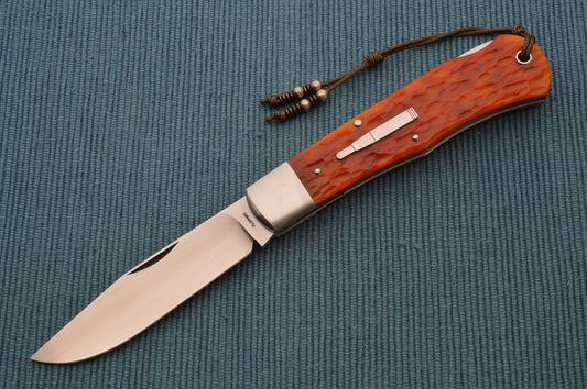 Tom Ploppert Remington 1303 Amber Jigged Bone Lock-Back Folding Knife