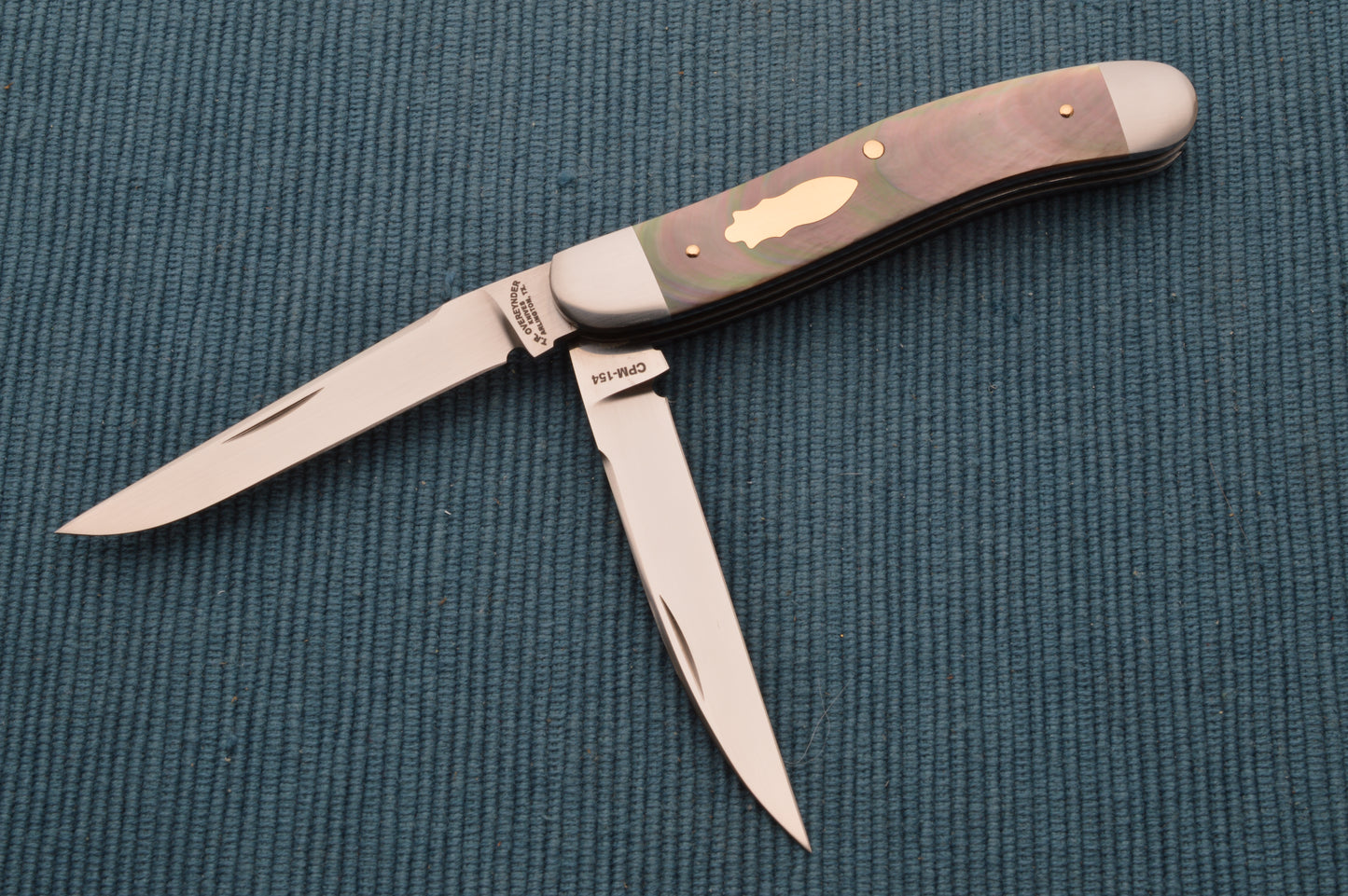 Tom Overeynder 2-Blade Serpentine Trapper, Black Lip Pearl and Gold Hardware