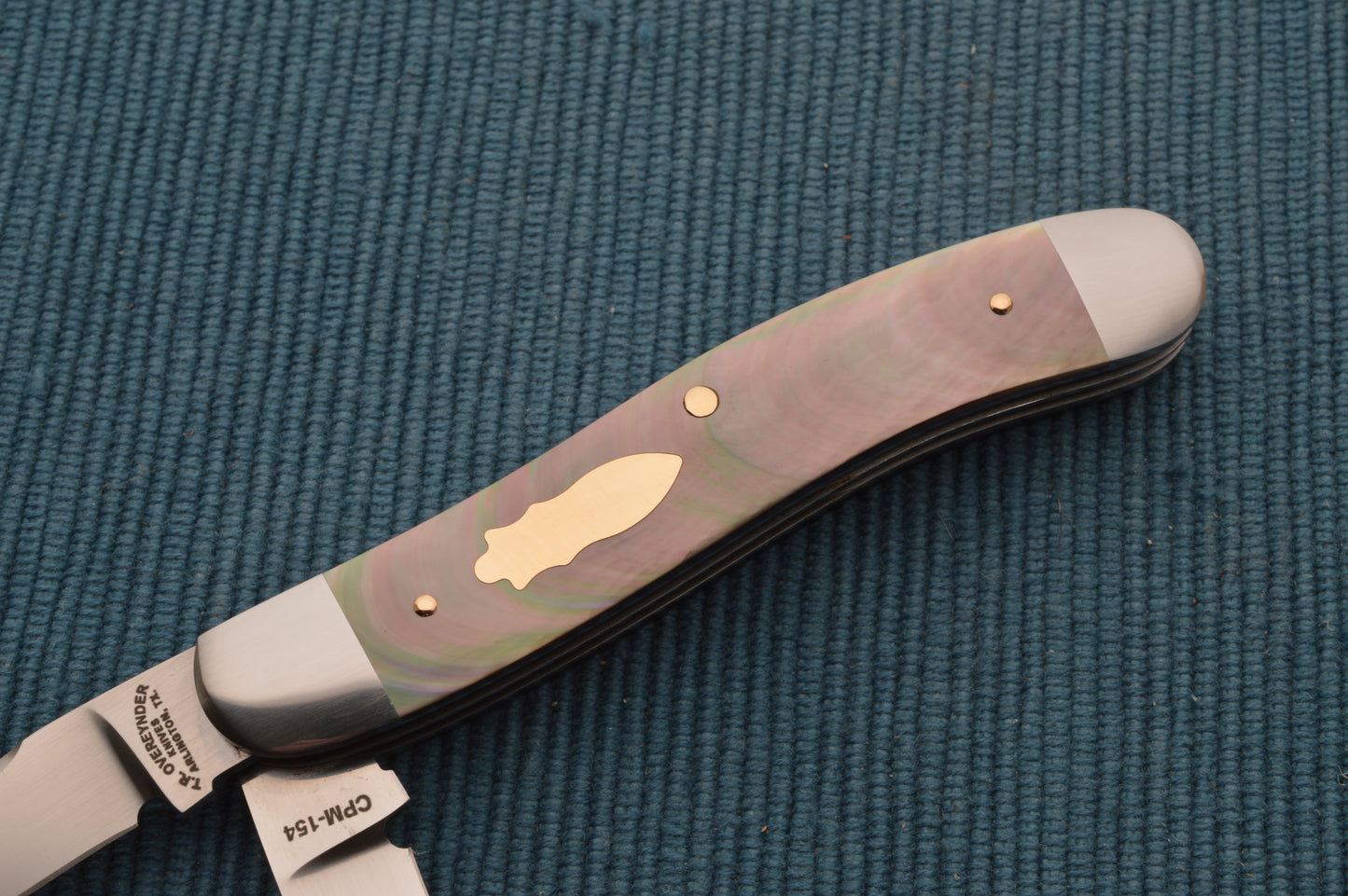 Tom Overeynder 2-Blade Serpentine Trapper, Black Lip Pearl and Gold Hardware