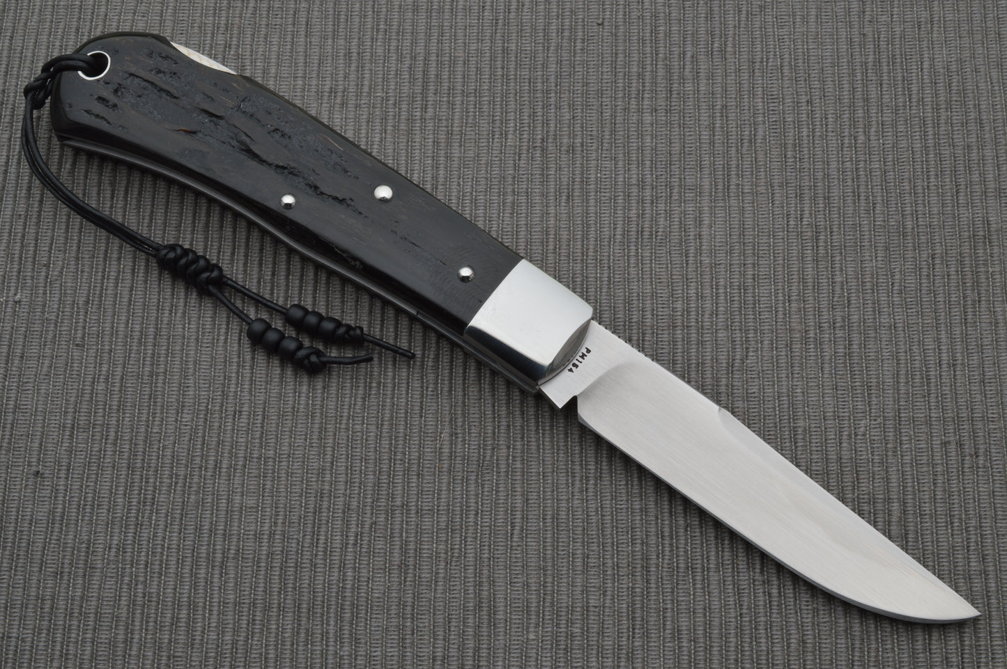 Tom Ploppert Cape Buffalo Horn 80% F1 Pro, Lock-Back Folding Knife