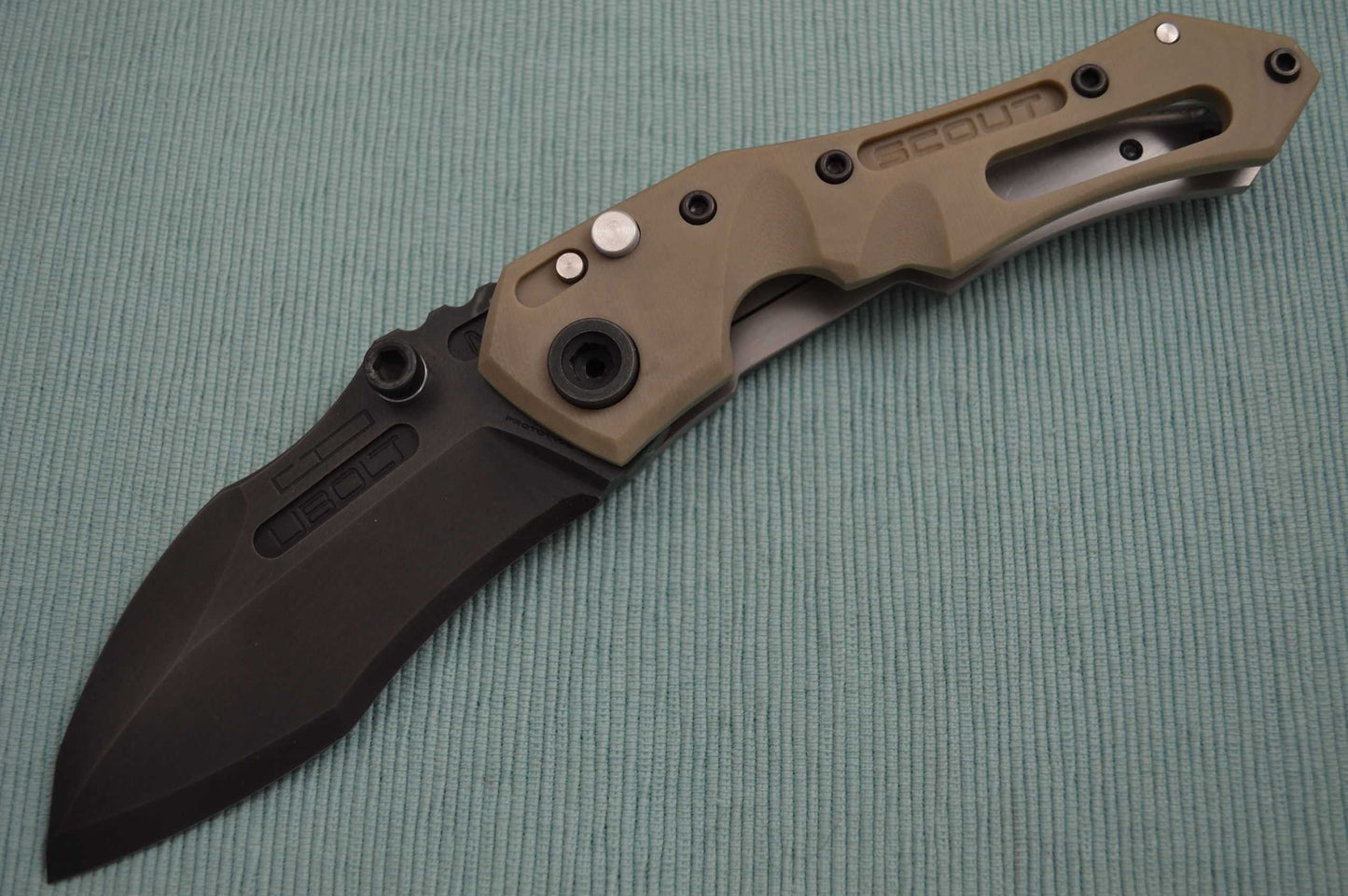 Dwaine Carrillo PROTOTYPE Button-Lock Scout M5, Desert Tan G10, Black Oxide Finish Blade (SOLD)