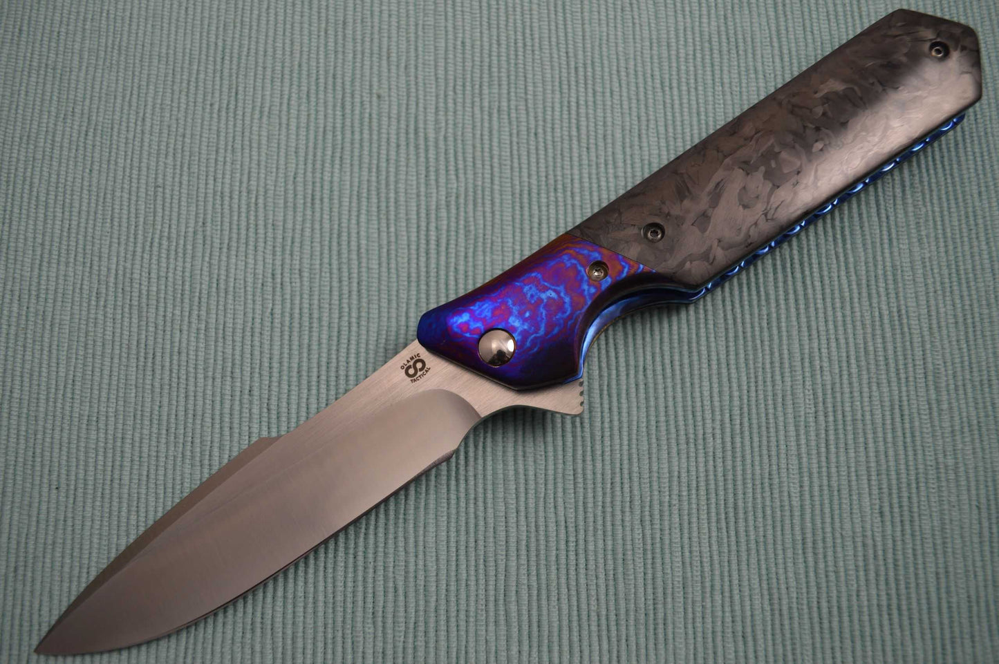 Olamic Cutlery Rainmaker, Marbled Carbon Fire Scales, Harpoon Blade, Ti-Damascus Bolster / Clip (SOLD)