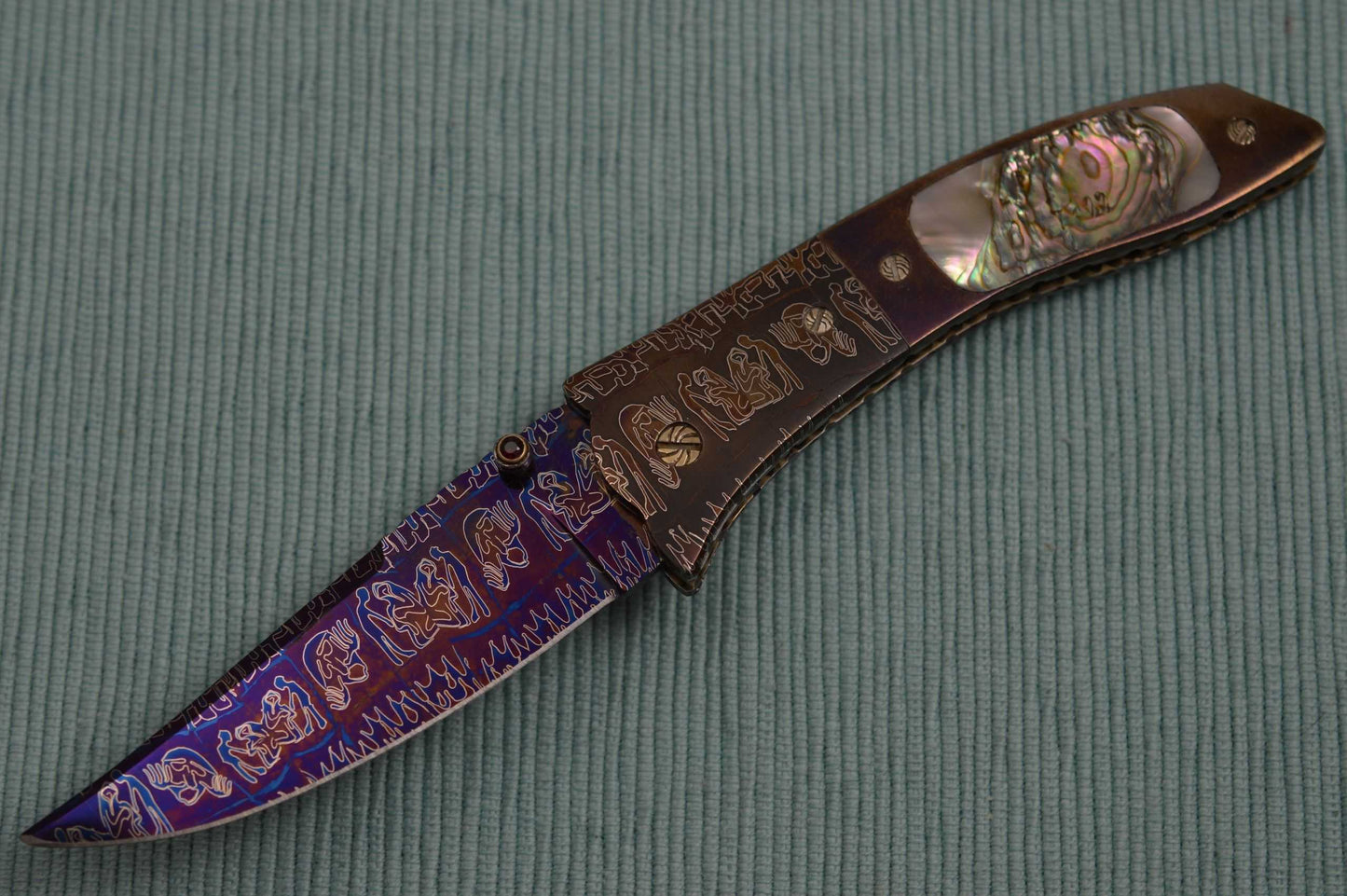 Joe Olson "Apocalypse" Interframe Folder, Damascus, Abalone, Ruby Thumbstud