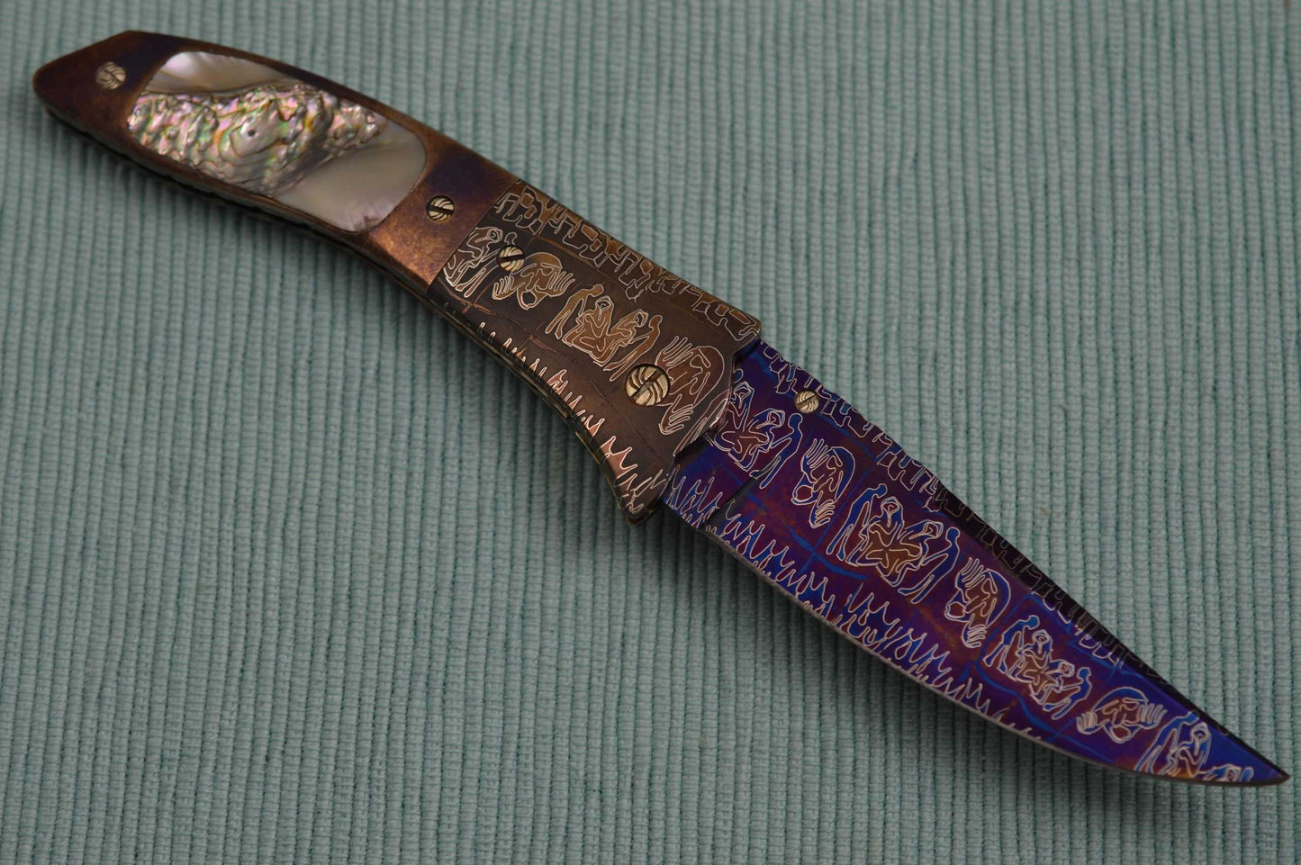 Joe Olson "Apocalypse" Interframe Folder, Damascus, Abalone, Ruby Thumbstud