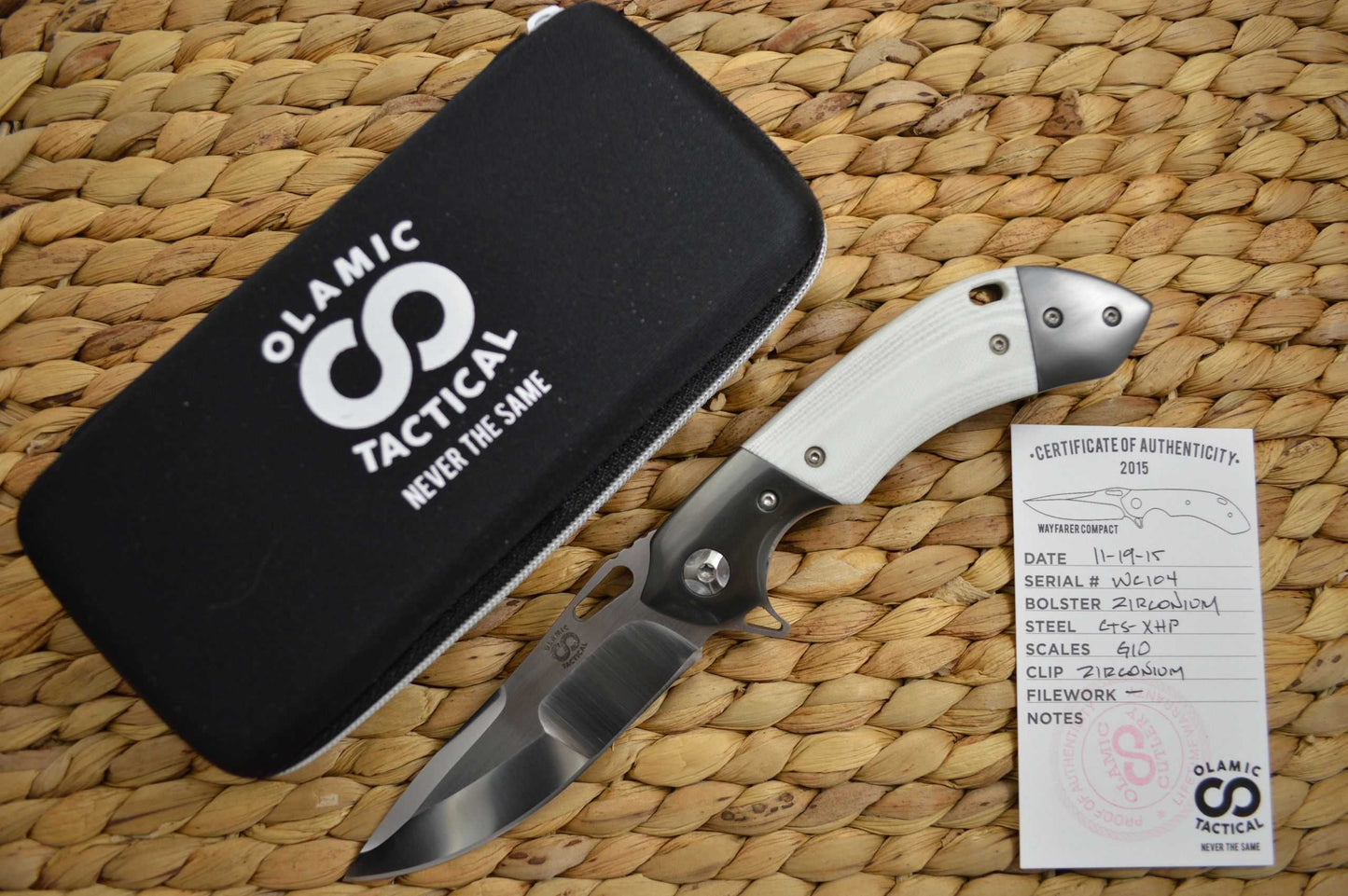 Olamic Cutlery Wayfarer Compact Flipper, Zirconium Bolsters, White G10 Scales (SOLD)